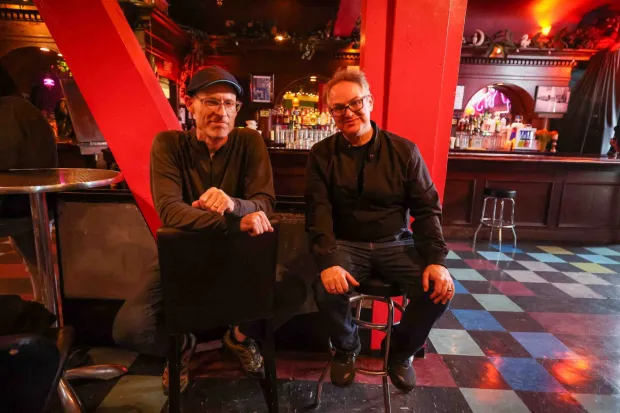 Filmmakers Chris Boone, left, and Kevin Smokler look on inside the Bottom of the Hill music venue in San Francisco, Calif., on Thursday, June 18, 2026. The filmmakers are producing a documentary film about the legendary independent San Francisco club that is closing at the end of the year. (Ray Chavez/Bay Area News Group)