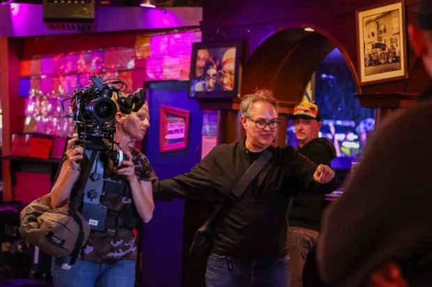 Sherri Kauk, left, listens to fillmaker director Kevin Smokler as they document the interior of the Bottom of the Hill music venue in San Francisco, Calif., on Thursday, June 18, 2026. Filmmakers Chris Boone and Kevin Smokler are producing a documentary film about the legendary independent San Francisco club that is closing at the end of the year. (Ray Chavez/Bay Area News Group)