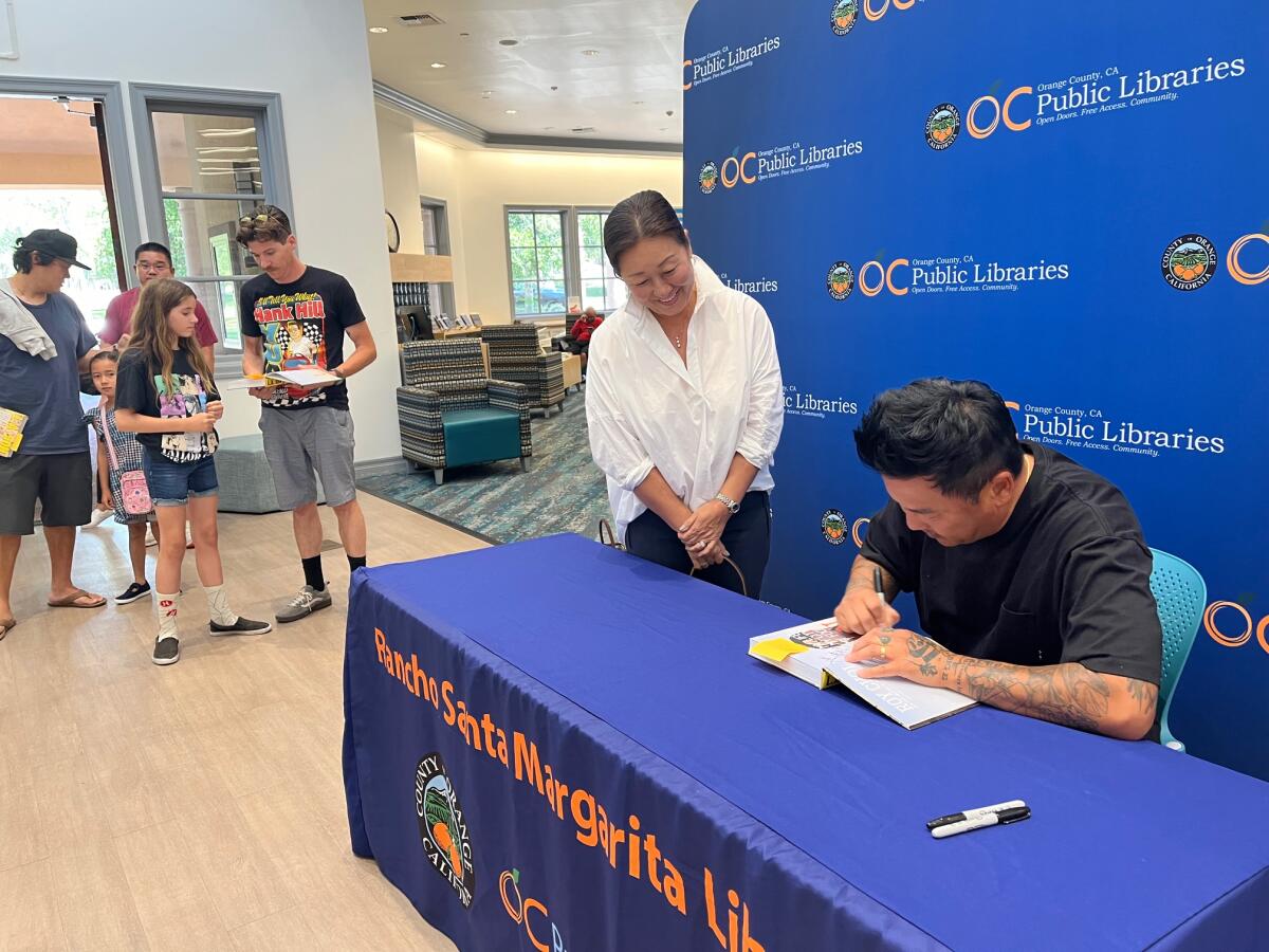 Roy Choi signed copies of his bestselling cookbook and memoir, “L.A. Son”, at the Rancho Santa Margarita Library on July 13.
