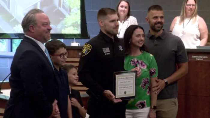 Oakland County Deputy honored after rescuing children from Orion Township house fire