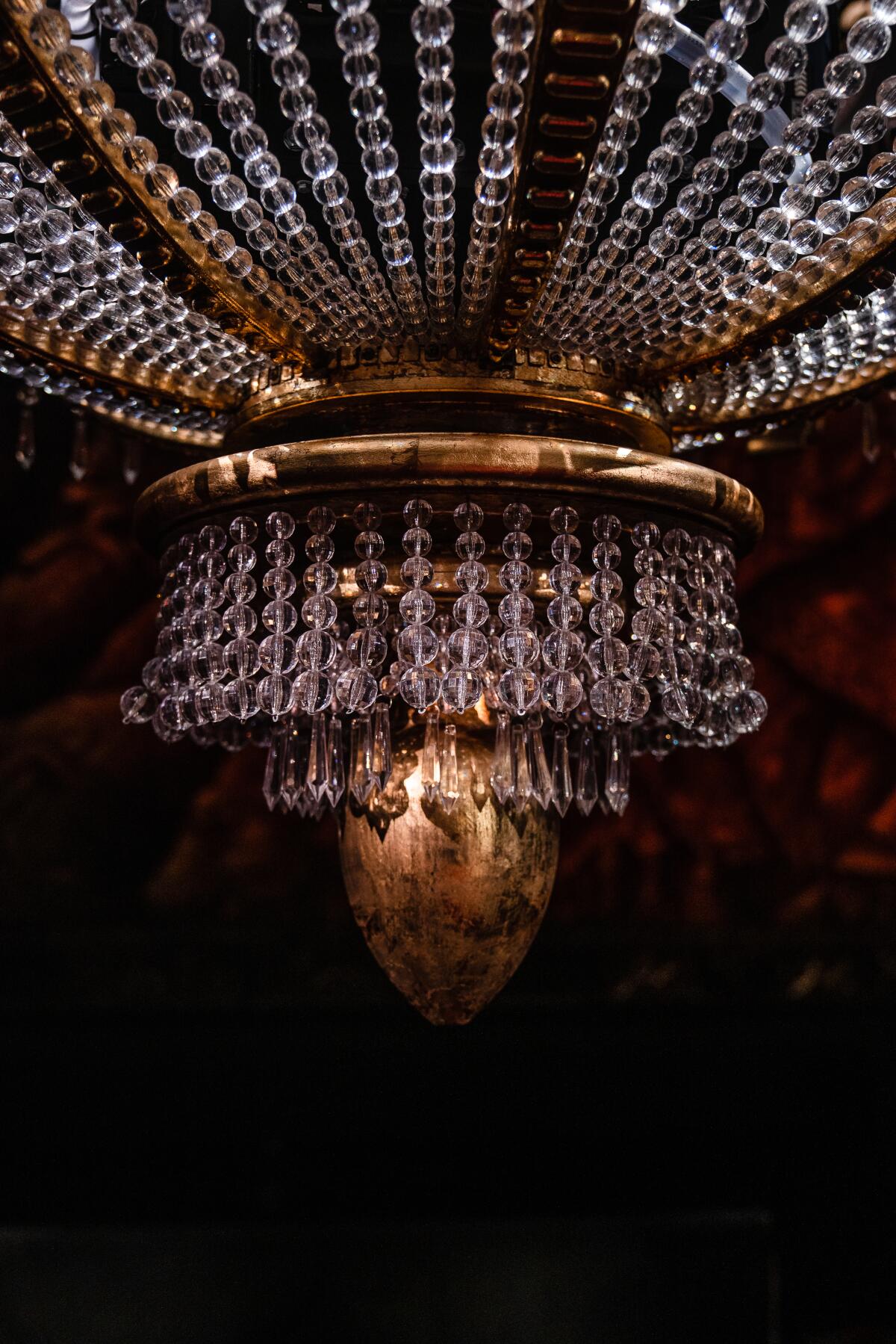 A section of the 2,000-pound chandelier set piece for "Phantom of the Opera" hangs in the Hollywood Pantages Theatre.