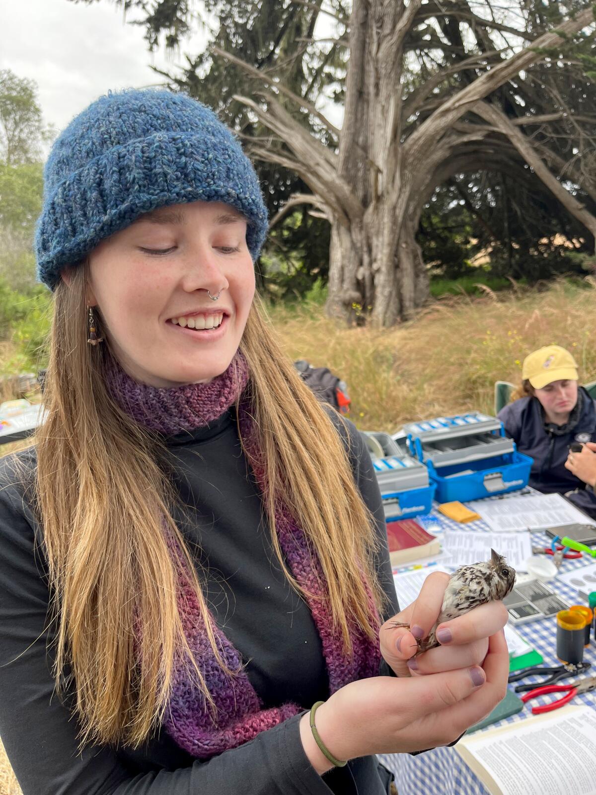 Eva Moylan with Song sparrow.