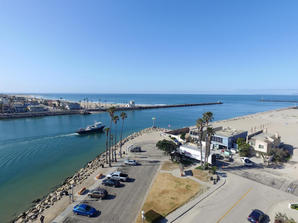 A fishing boat leaves Channel Islands Harbor 