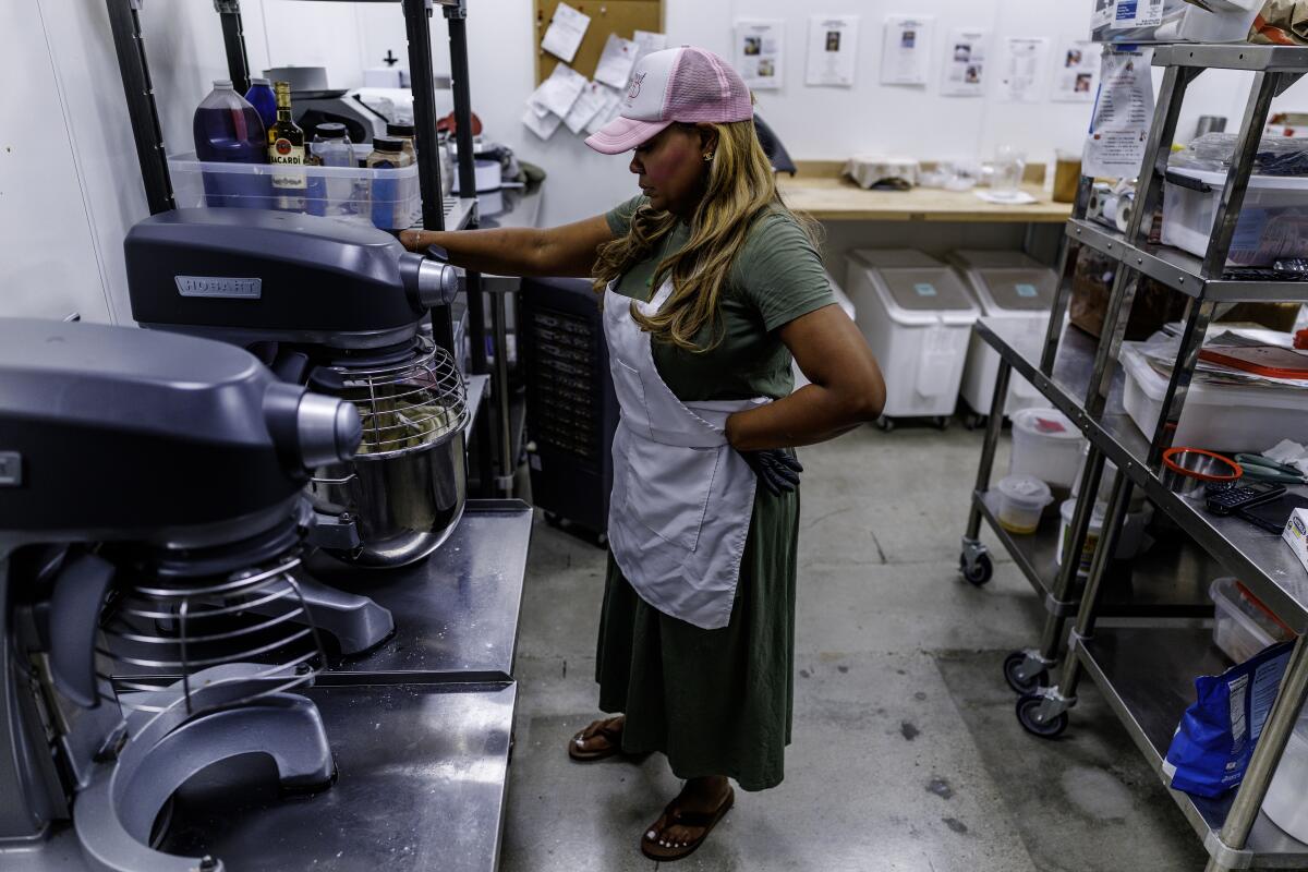 Kenyatta Glover working in a commercial kitchen