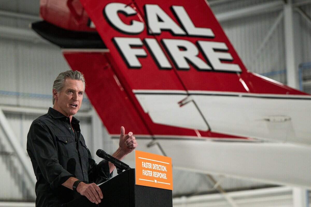 Gov. Gavin Newsom speaks at a news conference at Sacramento McClellan Airport in Sacramento on Tuesday, July 21, 2026. He briefly discussed return to office mandates for state employees, saying the order aims to foster creativity and build relationships.