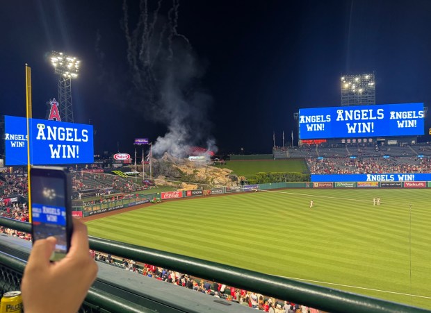 Fireworks blast and the message "Angels Win!" flashes in lights immediately after Tuesday's 5-1 victory against (sob!) the St. Louis Cardinals. (Photo by David Allen, Inland Valley Daily Bulletin/SCNG)