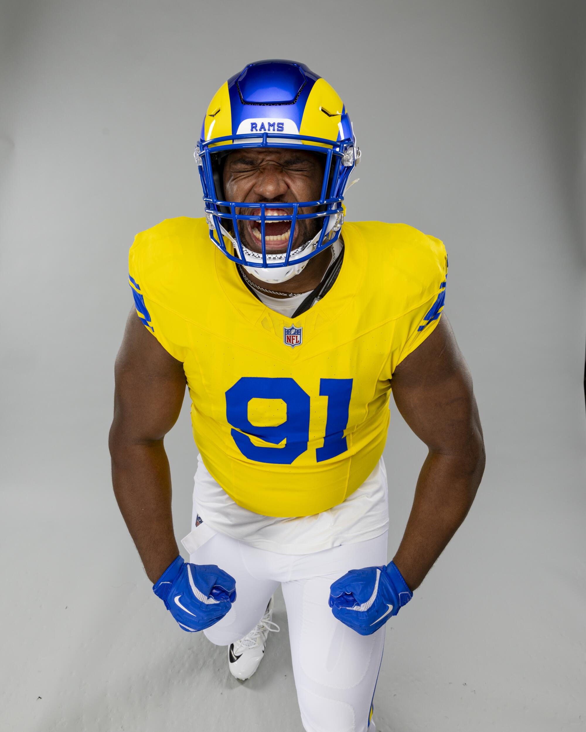 Rams defensive end Kobie Turner wears the Rams new "Classic Sol" uniform.