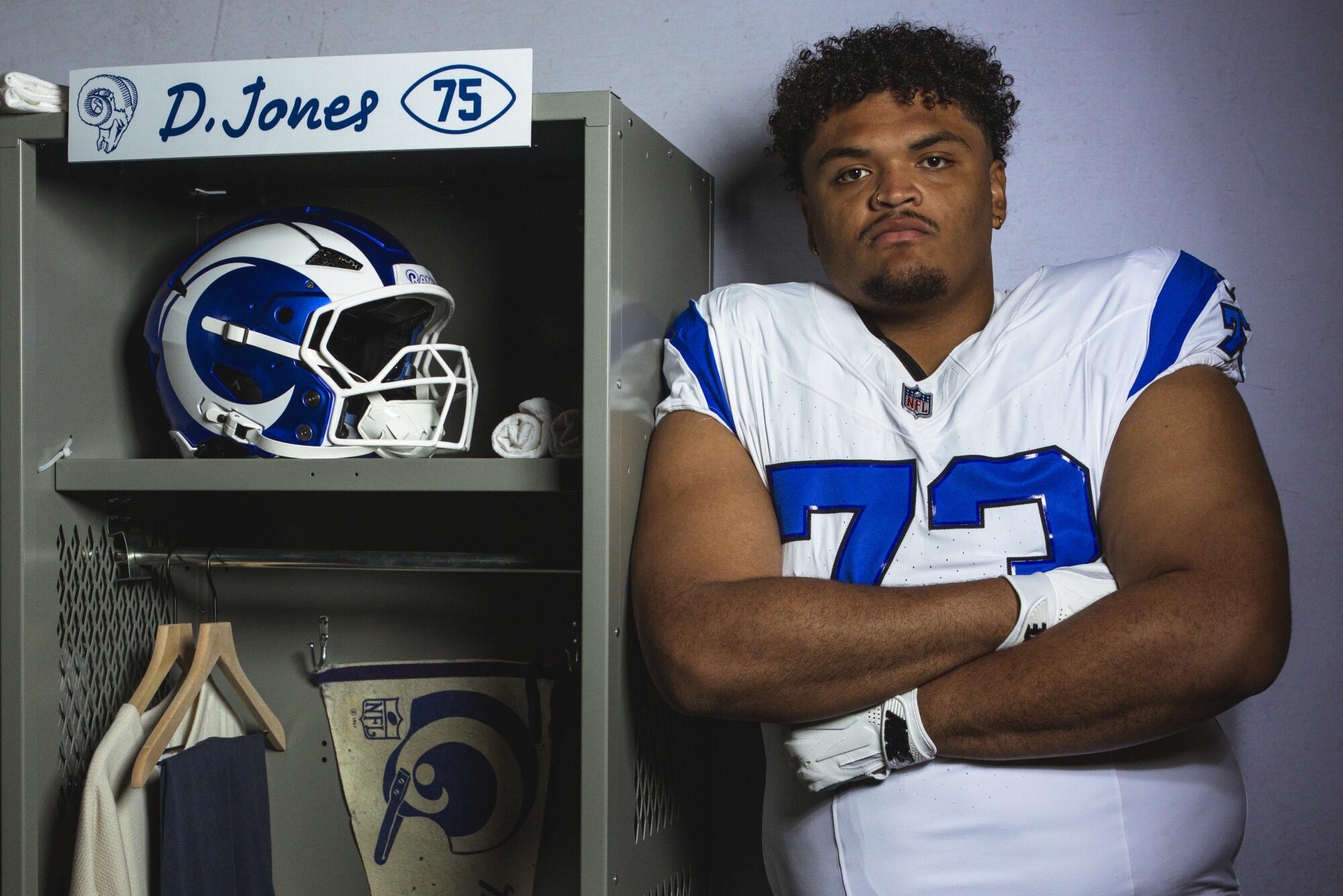 Rams offensive lineman Steve Avila wears the Rams' new "Fearsome White" uniform.