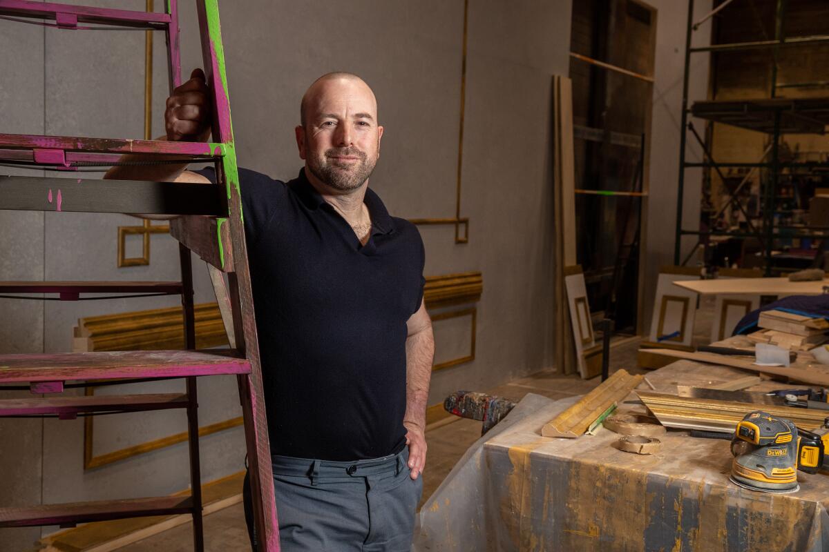 A man backstage at a theater.