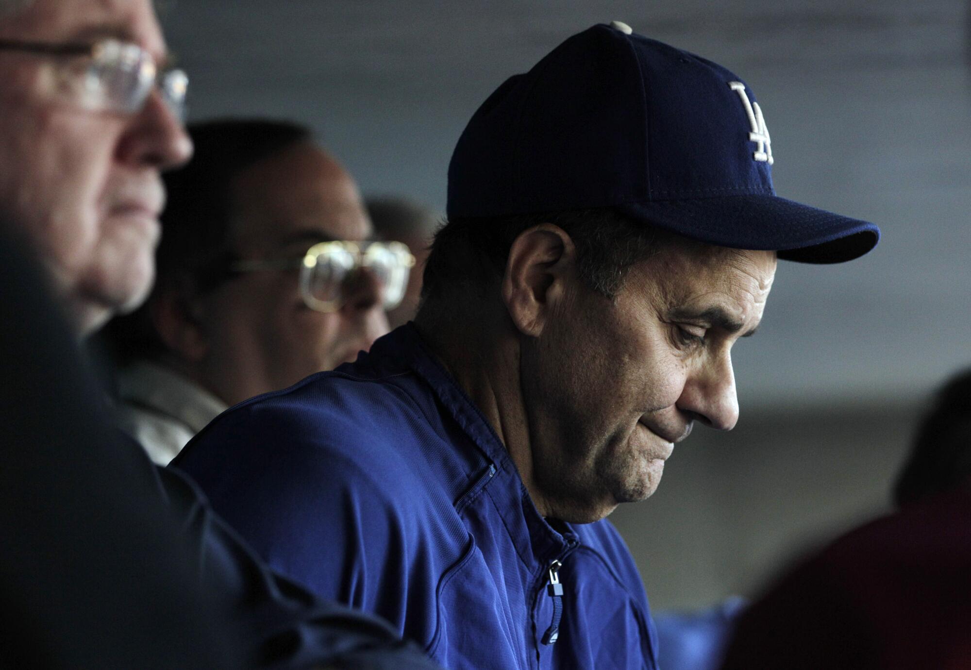 Dodgers manager Joe Torre pauses for a moment while answering questions in August 2010. 