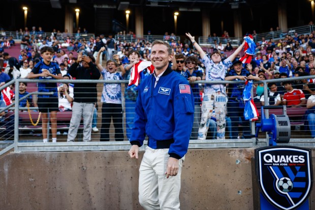 Warren Hoburg,  American engineer and NASA astronaut, fires the siren before a game between the San Jose Earthquakes and LA Galaxy at Stanford Stadium in Stanford, Calif., on Saturday, July 25, 2026.  (Shae Hammond/Bay Area News Group)