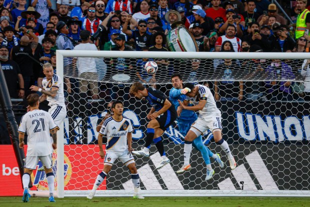 San Jose Earthquakes' Jack Skahan (16) attempts a goal against LA Galaxy's goalkeeper JT Marcinkowski (12), LA Galaxy's Miki Yamane (2), and LA Galaxy's Maya Yoshida (4) in the first half at Stanford Stadium in Stanford, Calif., on Saturday, July 25, 2026. (Shae Hammond/Bay Area News Group)
