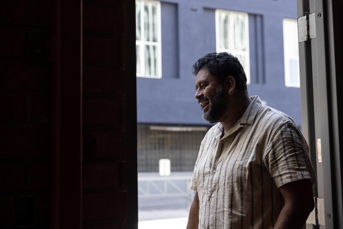 Estuardo Mazariegos stands in the doorway of Audio Graph Beer Co.during a fundraising.