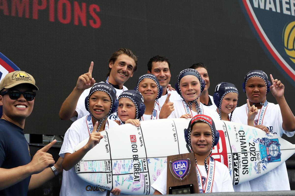 The Newport Beach Water Polo Club 10U boys pose with their gold medal after winning against 908 on Sunday.