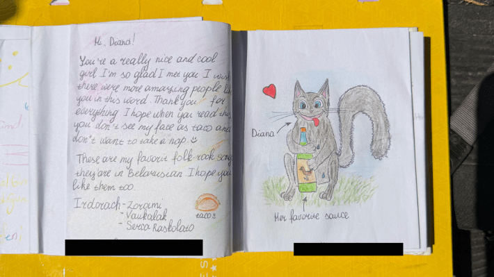 a handwritten note and drawing