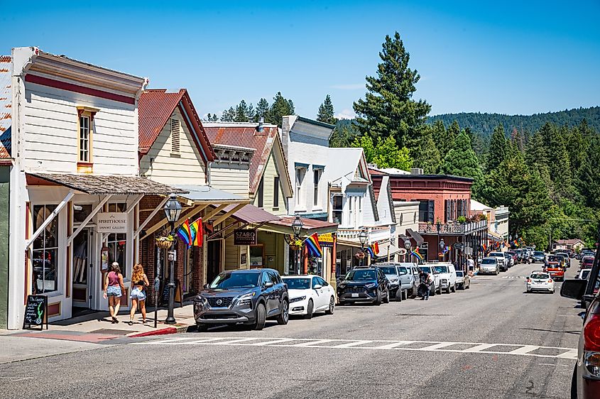 Historic Broad Street in downtown Nevada City, California, lined with 19th-century buildings.