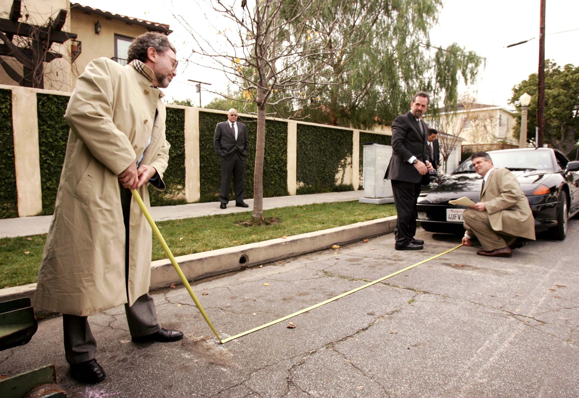 Jan. 2005 image of preparation for a field trip by Blake and the jury to the street where wife died.