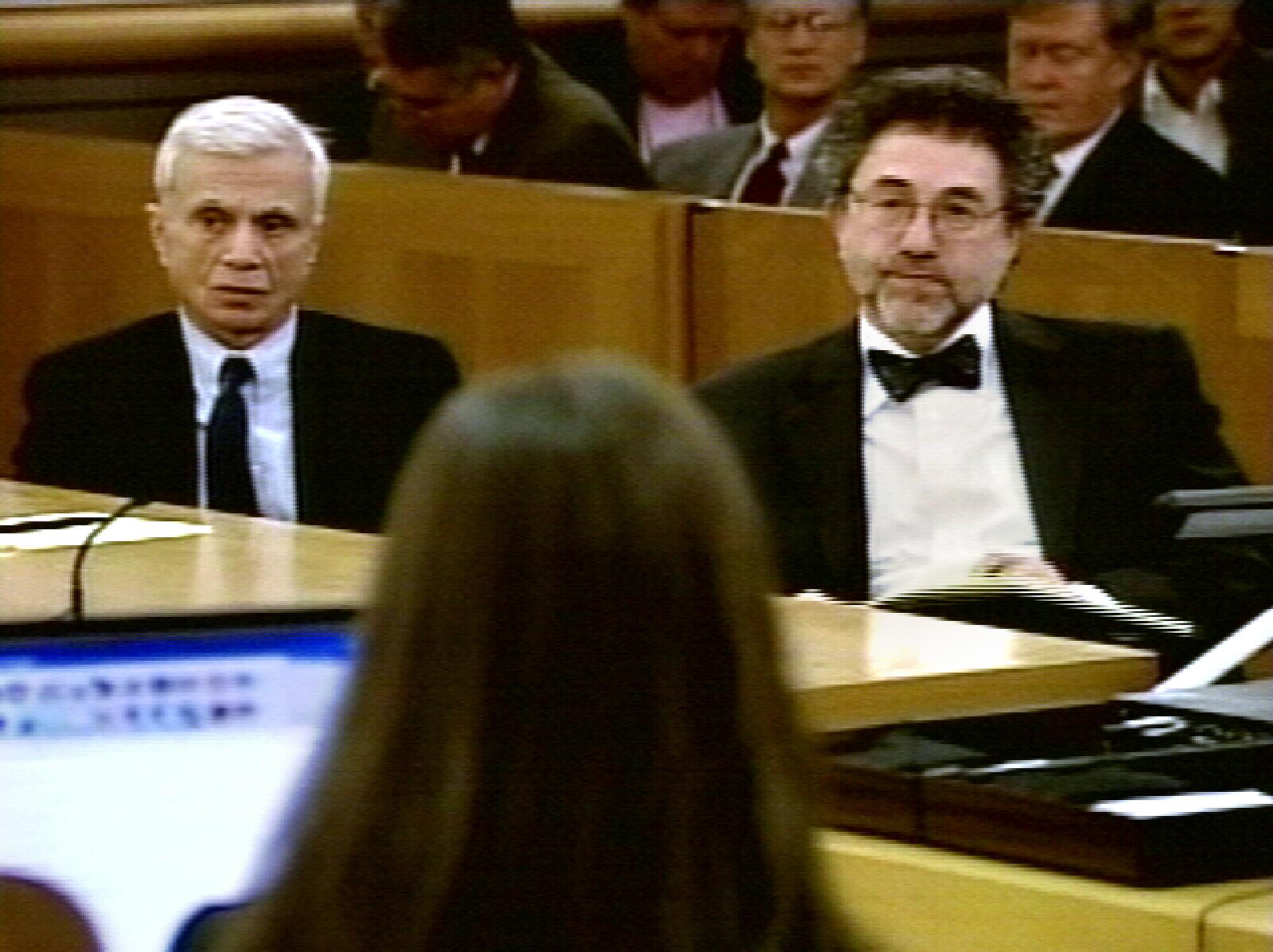 In this image from video, actor Robert Blake, left, and his attorney M. Gerald Schwartzbach, appear in court.