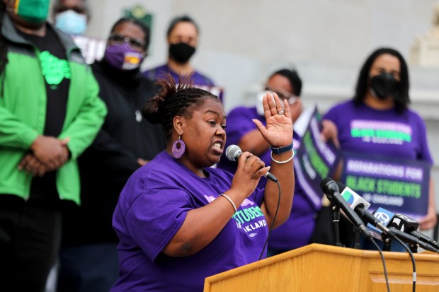 Pecolia Manigo, of Reparations for Black Students, speaks at a press conference at Oakland City Hall in Oakland, Calif., on Wednesday, Feb. 9, 2022. Assemblymember Mia Bonta, Oakland Unified School District board member Mike Hutchinson, who voted against the Oakland school closures, and other local elected officials and parents delivered their message to the majority of the OUSD Board of Education who voted on the proposal of school closures and consolidations. (Ray Chavez/Bay Area News Group)