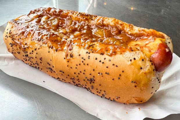 The Chili Cheese Dog at Portillo's in Buena Park comes with a steamed poppy seed bun, beef chili and American cheese. (Photo by Brock Keeling, Orange County Register/SCNG)