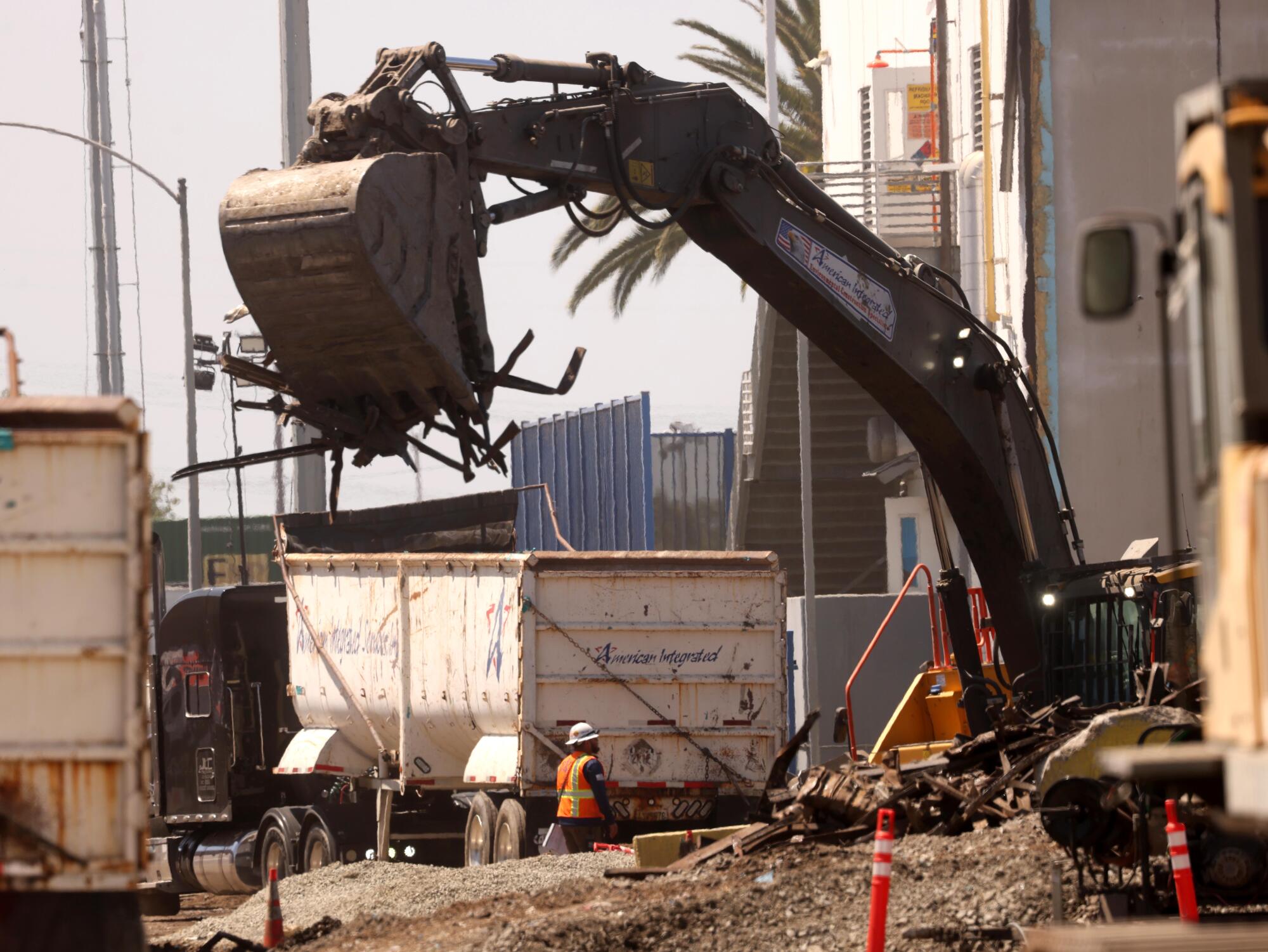 Cleanup continues at the Lineage warehouse in Boyle Heights on Wednesday.