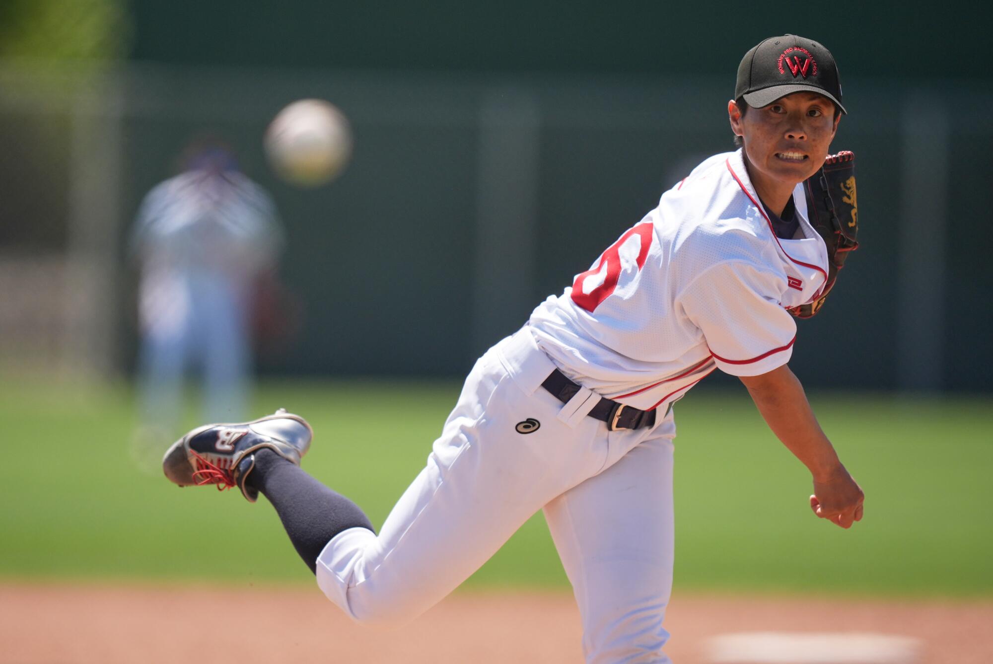 Ayami Sato pitches during a Women's Pro Baseball League exhibition game in March 19 in Fort Myers, Fla.