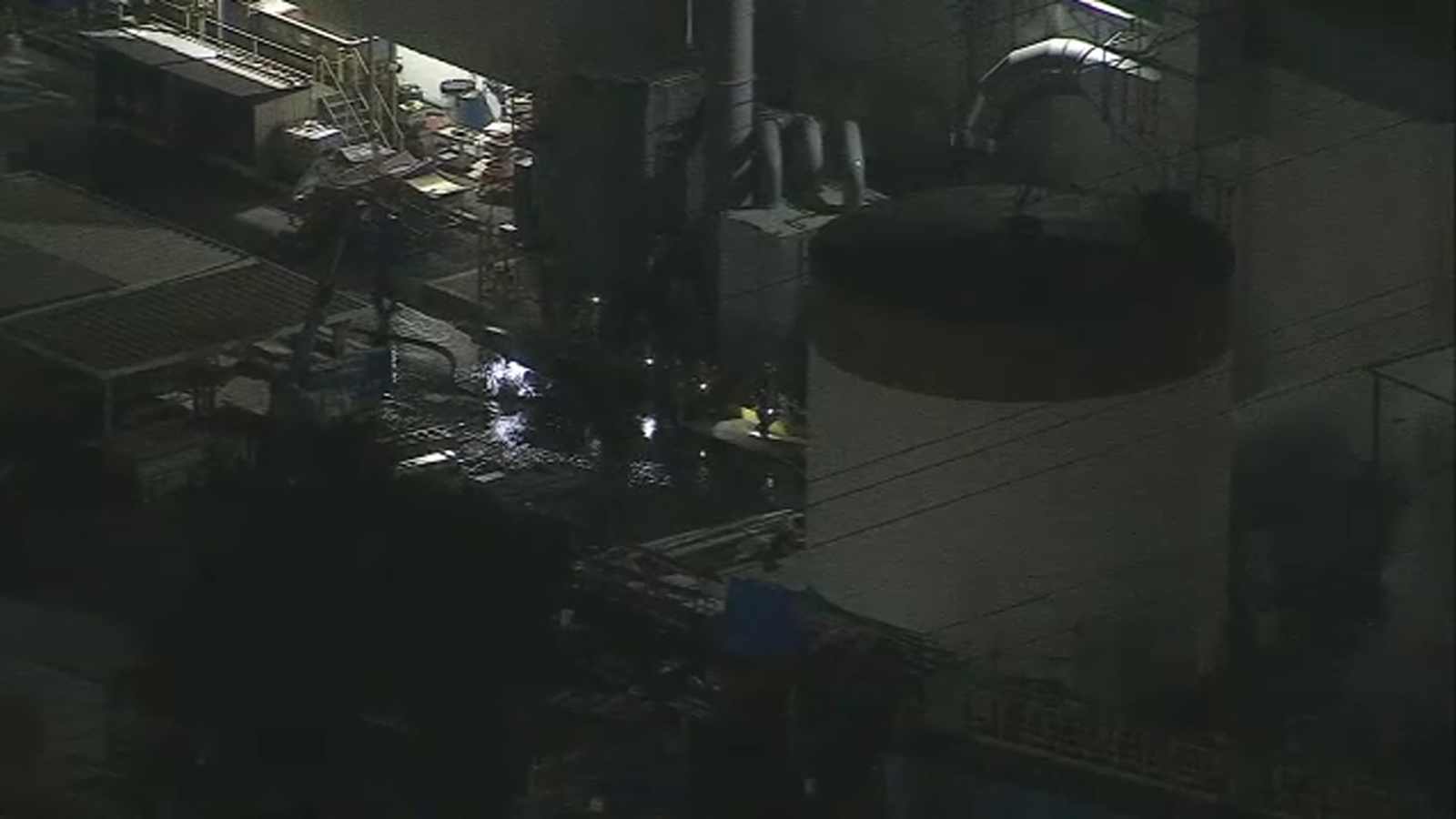 Firefighters seen surrounding tank at center of chemical crisis in OC