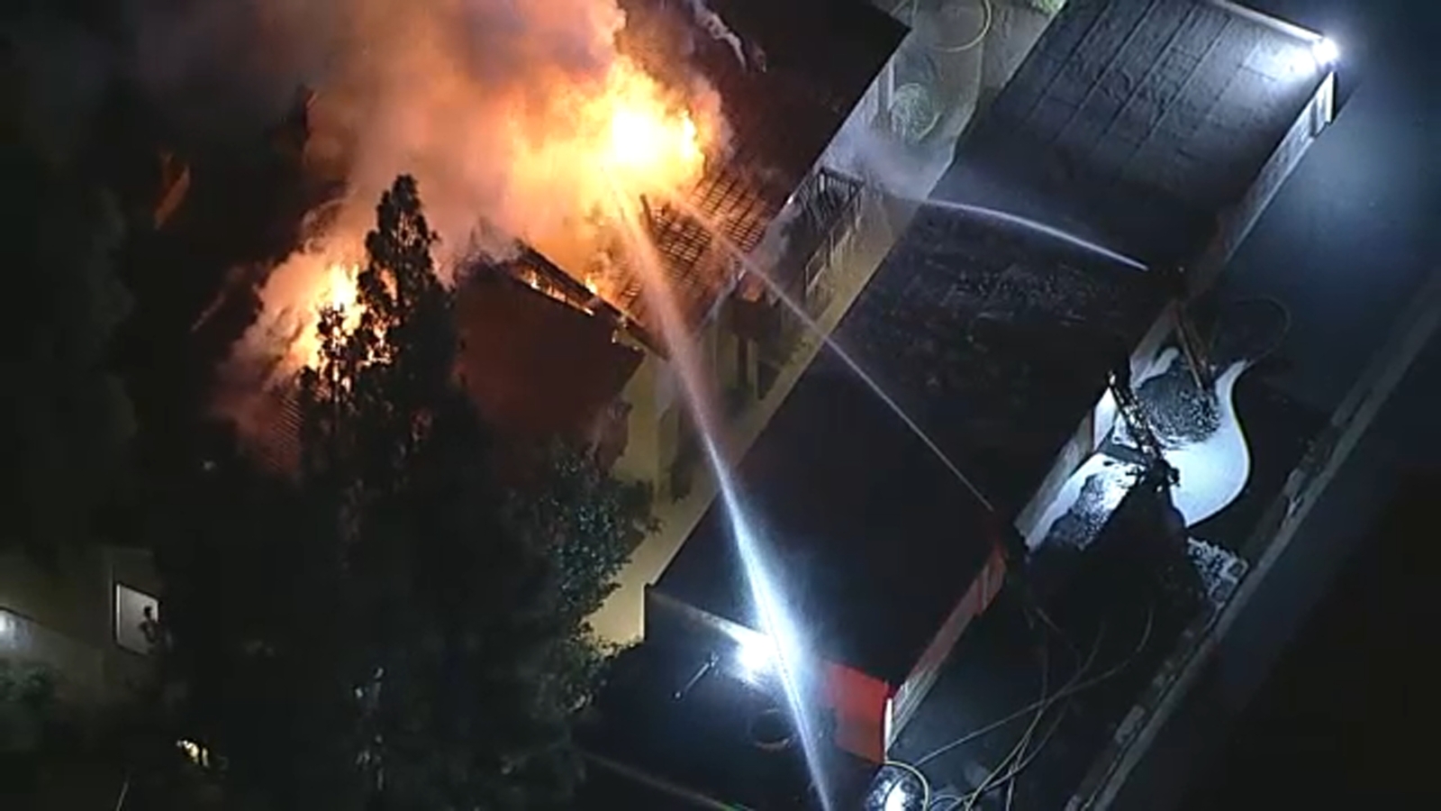 Hourslong barricaded suspect scene escalates to house fire with shots fired in Woodland Hills, fire officials say