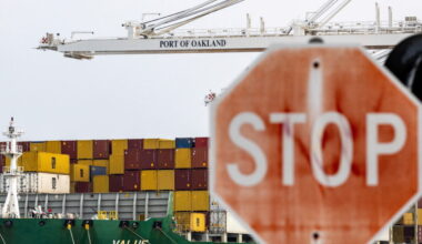 Shipping containers at the port of Oakland , California