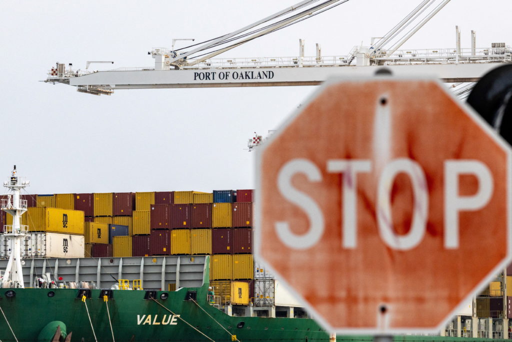 Shipping containers at the port of Oakland , California