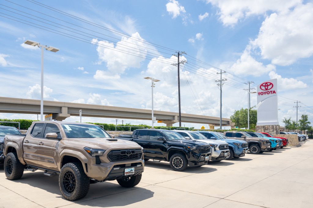 Toyota Tacomas on display for sale at the Toyota Cedar Park dealership.