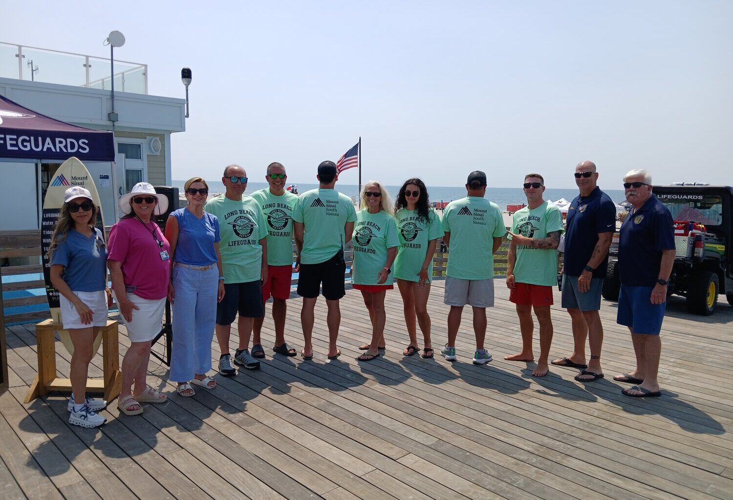 Members of the Long Beach lifeguards displayed this year&rsquo;s shirt, sponsored by Mount Sinai South Nassau.