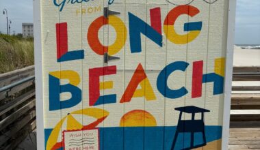 Every beach entrance along the boardwalk features a ticket booth-covering mural.