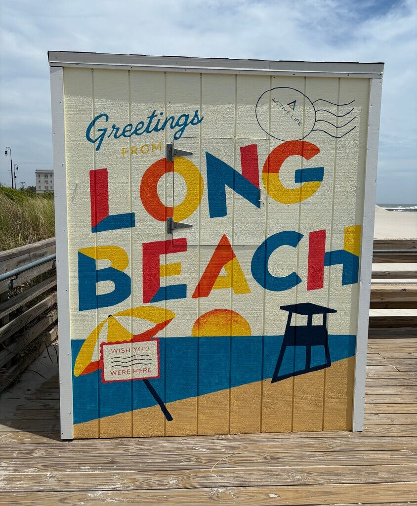 Every beach entrance along the boardwalk features a ticket booth-covering mural.