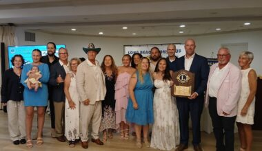 The first Charles McAvoy was a charter member of the Long Beach Lions Club in 1926. Three generations later, the family was honored for continuing the tradition of local service. The current Charles McAvoy wore the trademark green cowboy hat his father, Robert, wore to every Lions Club event.