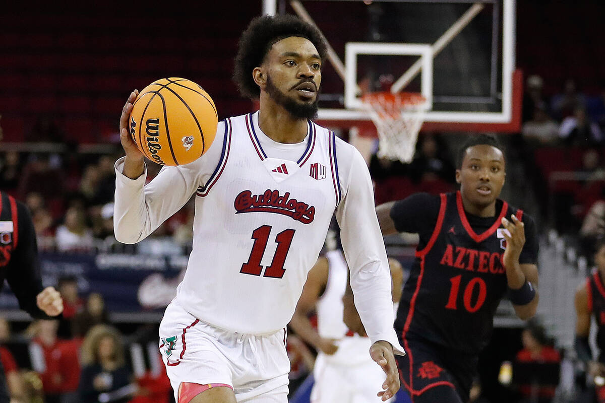 FILE - Fresno State's Mykell Robinson drives against San Diego State during the second hal ...
