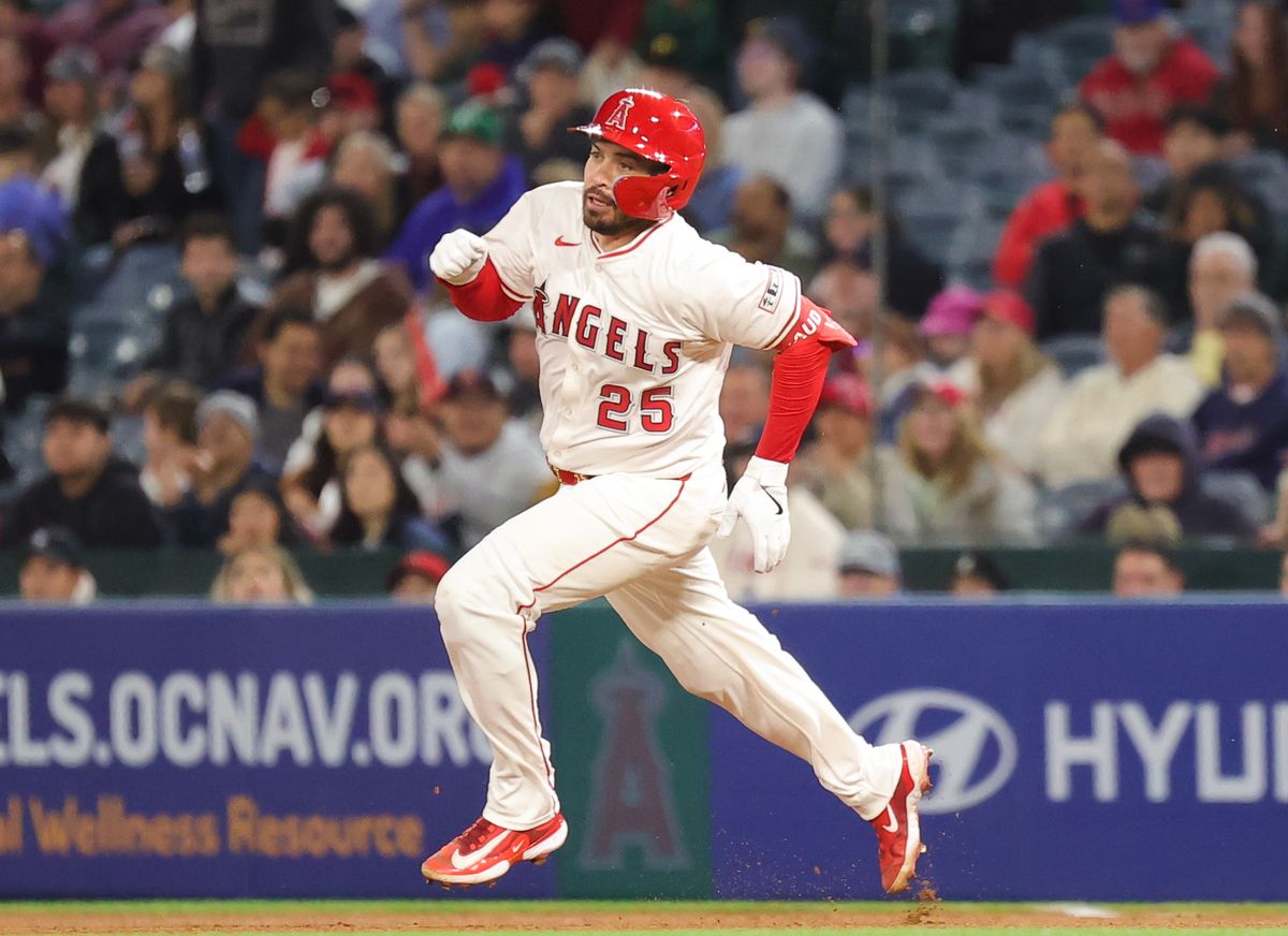 Los Angeles Angels catcher #25 Travis d'Arnaud runs the bases during an MLB game against the Pittsburg Pirates on April 23, 2025 in Anaheim, CA. Los Angeles Angels catcher #25 Travis d'Arnaud runs the bases during an MLB game against the Pittsburg Pirates on April 23, 2025 in Anaheim, CA.