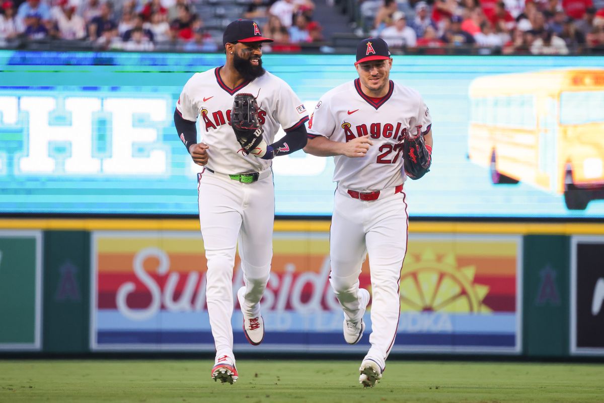 Los Angeles Angels outfielders Mike Trout (27) and Jo Adell (7) run during the MLB game against the St. Louis Cardinals Tuesday July 21st, 2026 at Angel Stadium in Anaheim, Calif. Los Angeles Angels outfielders Mike Trout (27) and Jo Adell (7) run during the MLB game against the St. Louis Cardinals Tuesday July 21st, 2026 at Angel Stadium in Anaheim, Calif.