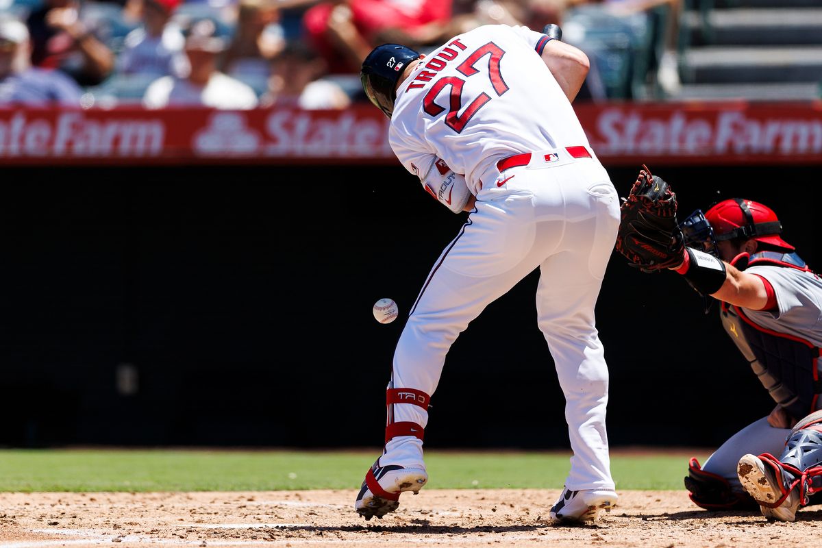Mike Trout #27 of the Los Angeles Angels is hit with a pitch during the game against the St. Louis Cardinals at Angel Stadium of Anaheim on July 22, 2026 in Anaheim, California. Mike Trout #27 of the Los Angeles Angels is hit with a pitch during the game against the St. Louis Cardinals at Angel Stadium of Anaheim on July 22, 2026 in Anaheim, California.