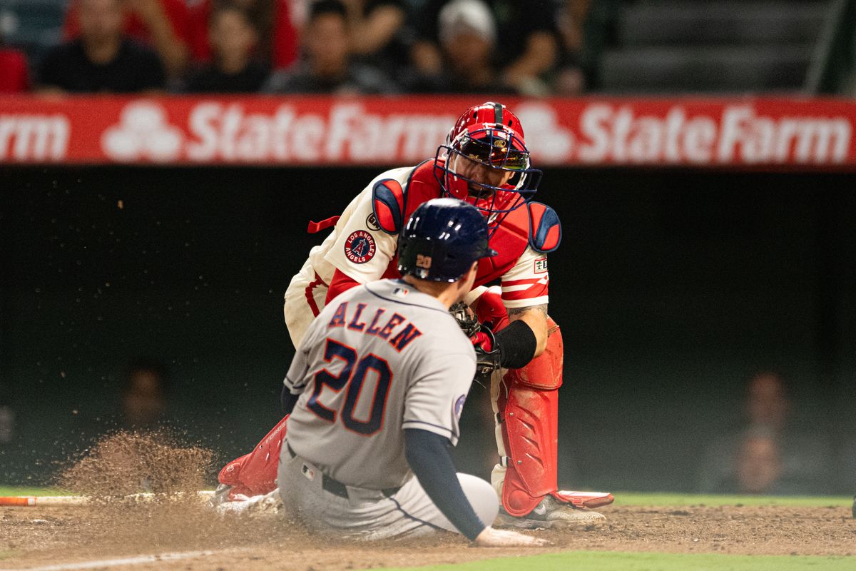 Houston Astros short stop Nick Allen (20) is tagged out at home plate during a game between the Houston Astros and the Los Angeles Angels on Monday, July 27, 2026 at Angels Stadium in Anaheim Calif. Houston Astros short stop Nick Allen (20) is tagged out at home plate during a game between the Houston Astros and the Los Angeles Angels on Monday, July 27, 2026 at Angels Stadium in Anaheim Calif.
