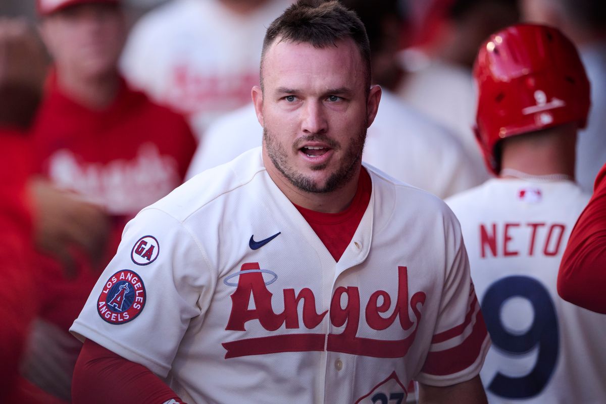 The Los Angeles Angels Mike Trout #27 celebrates a run during an MLB game against The Houston Astros on July 29th, 2026 at Angel Stadium in Anaheim, California. The Los Angeles Angels Mike Trout #27 celebrates a run during an MLB game against The Houston Astros on July 29th, 2026 at Angel Stadium in Anaheim, California.