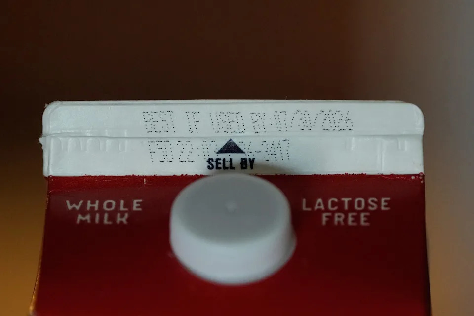 A Best If Used By date is stamped above a Sell By label on a milk carton, Tuesday, June 30, 2026, in San Francisco. (AP Photo/Jeff Chiu) - The Associated Press