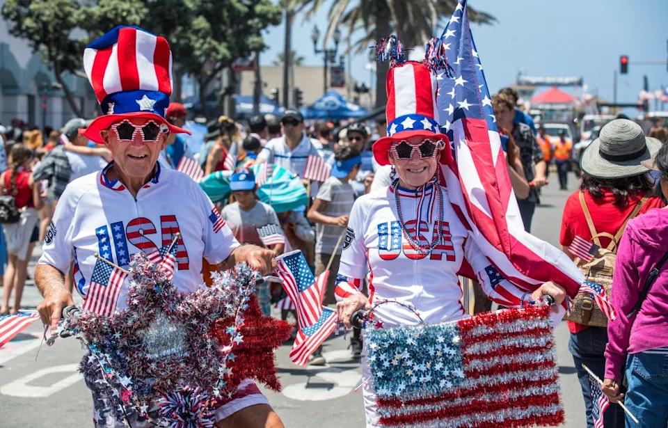 Ron and Jean Hetherington of Huntington Beach show off their holiday attire along Main Street in Huntington Beach following the 115th annual Fourth of July parade on Thursday morning, July 4, 2019. MediaNews Group via Getty Images