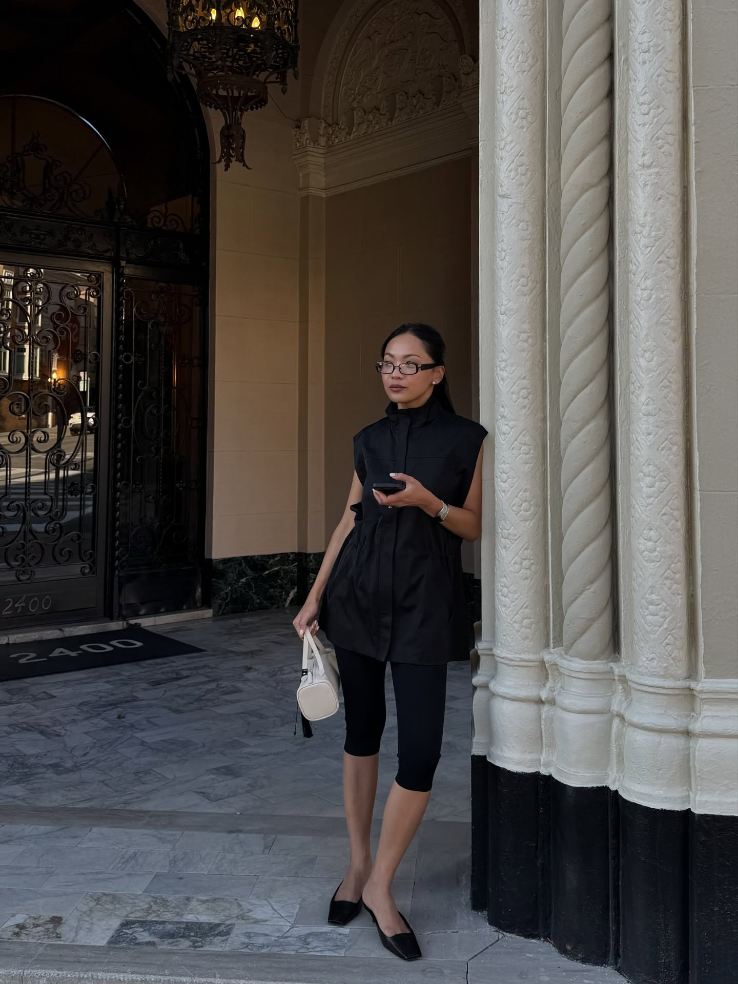 Dawn in capris, vest and kitten heels