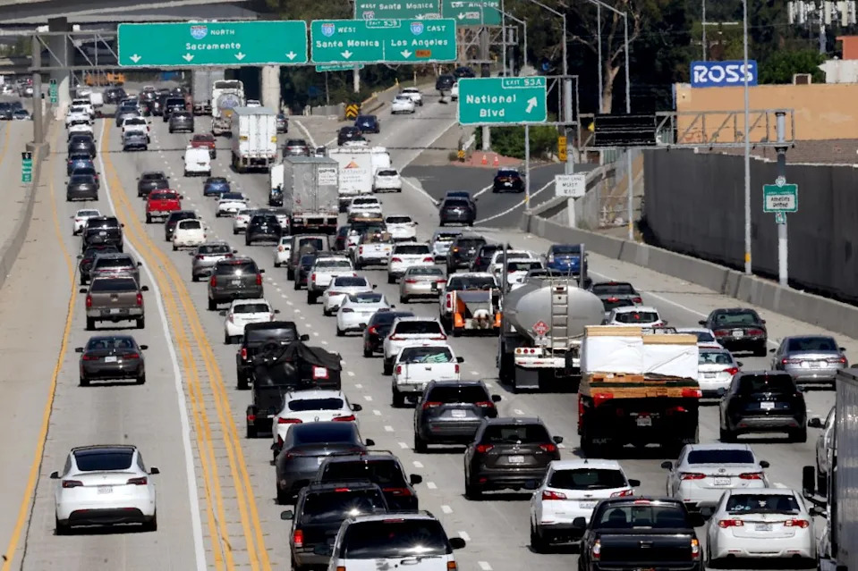LA commuters face the daily grind as school and office schedules create peak-hour gridlock. Los Angeles Times via Getty Images