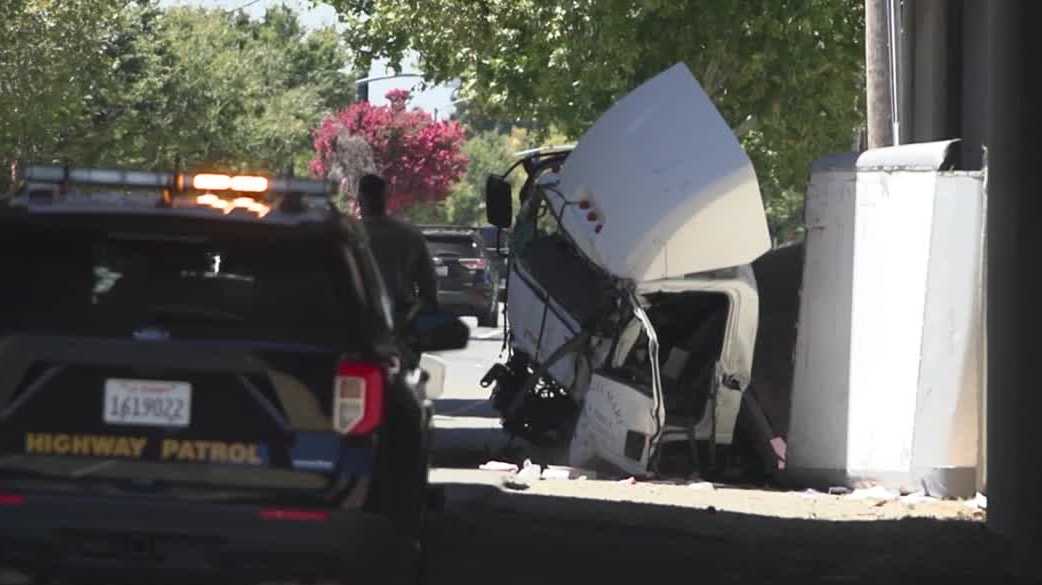Box truck falls off I-5 overpass, narrowly missing family