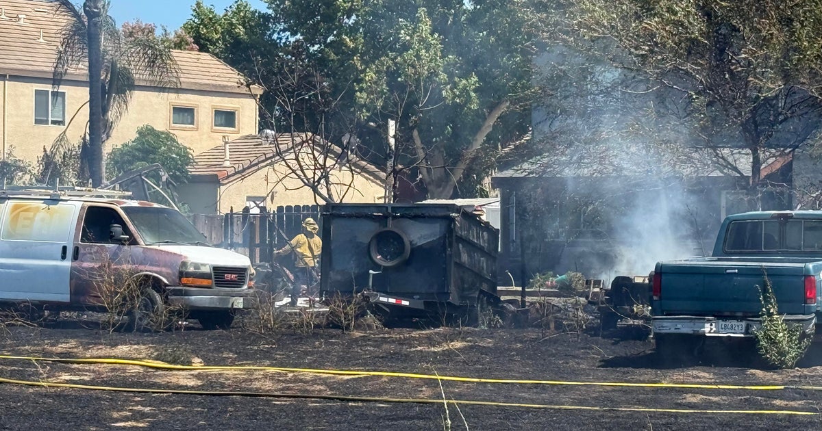 Tracy grass fire damages structures and vehicles, forces evacuations