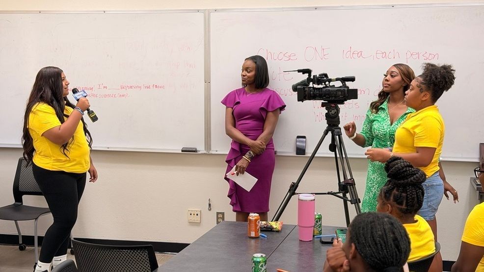 Girls take turns practicing their reporting and cameras skills at Expose Her Academy at CSUB. PHOTO: KBAK