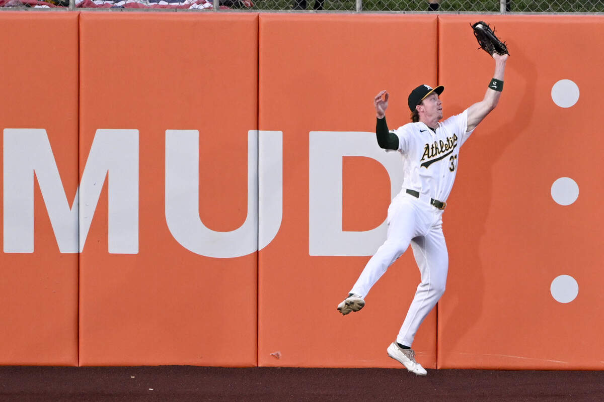 Athletics outfielder Henry Bolte (33) catches a fly ball during a game against the Washington Nationals at Sutter Health Park in West Sacramento on Friday, July 17, 2026.