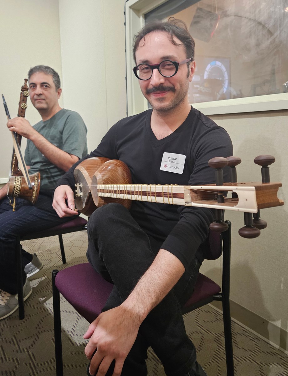 Behfar Bahadoran plays the Tar, a lute-like instrument. He says it is refreshing to share Iranian music and culture with American audiences.